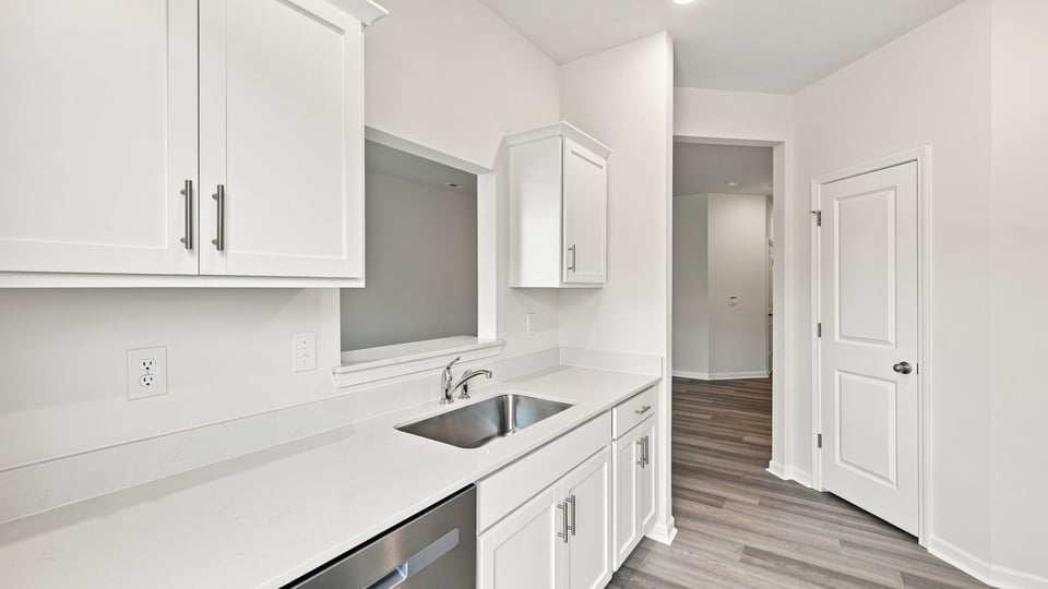 Kitchen with stainless steel appliances.