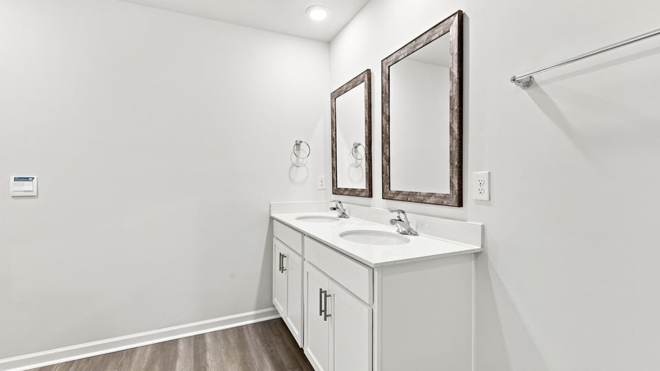 Bathroom with double vanity sink.a