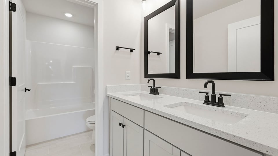 Bathroom with double vanity sink.