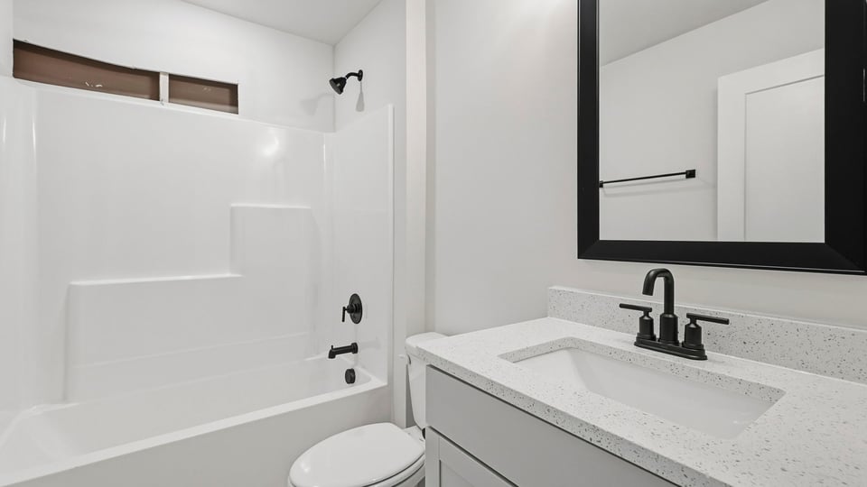 Bathroom with bathtub.