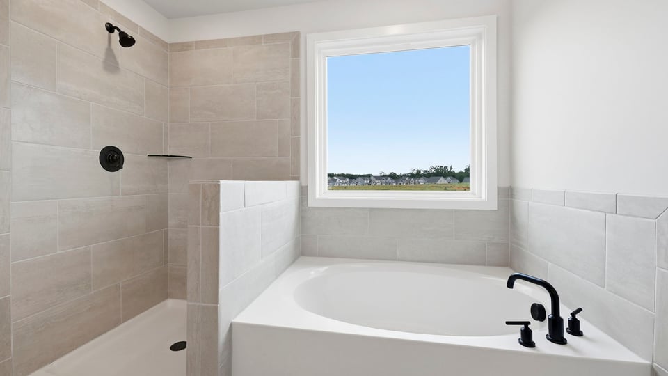 Bathroom with bathtub.