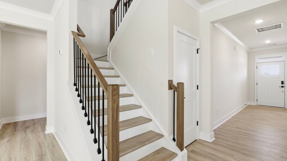 Stairs to additional bedrooms.