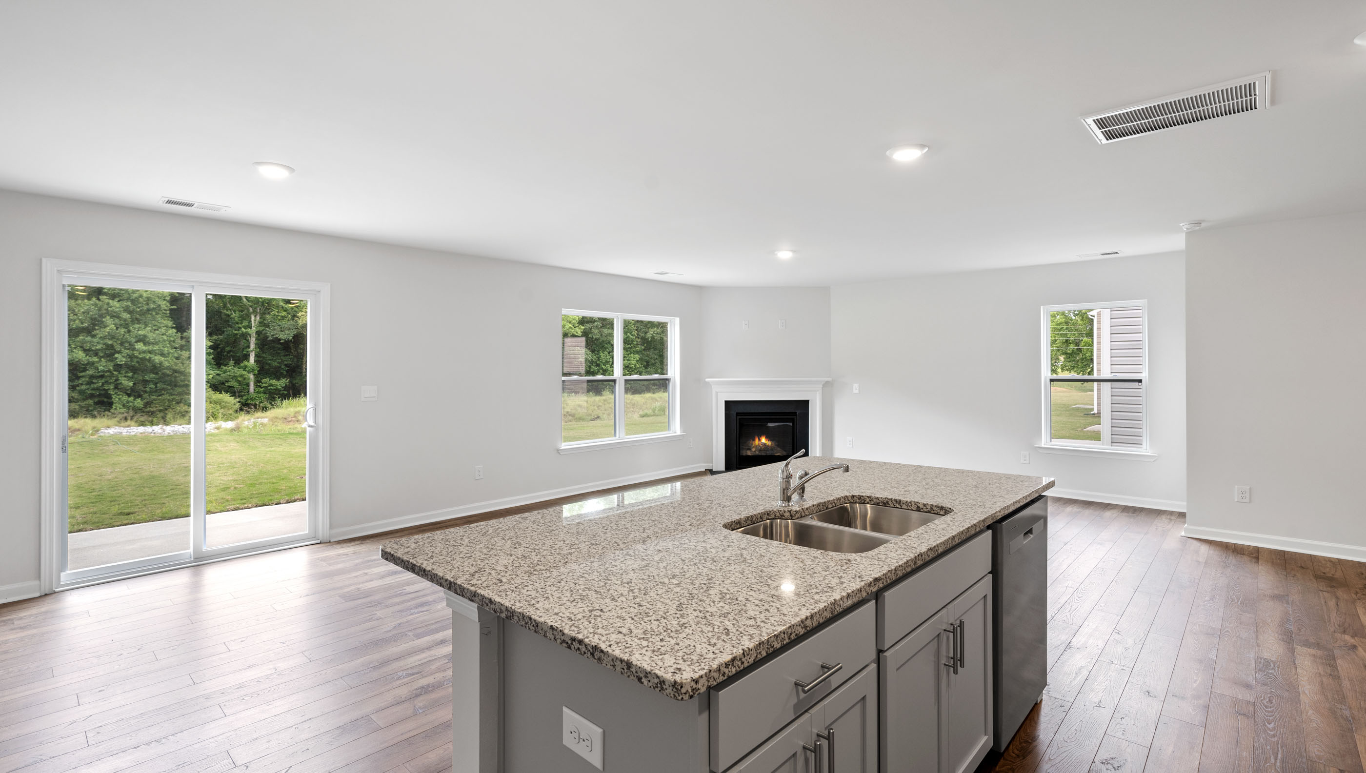 Kitchen with island and cabinets.