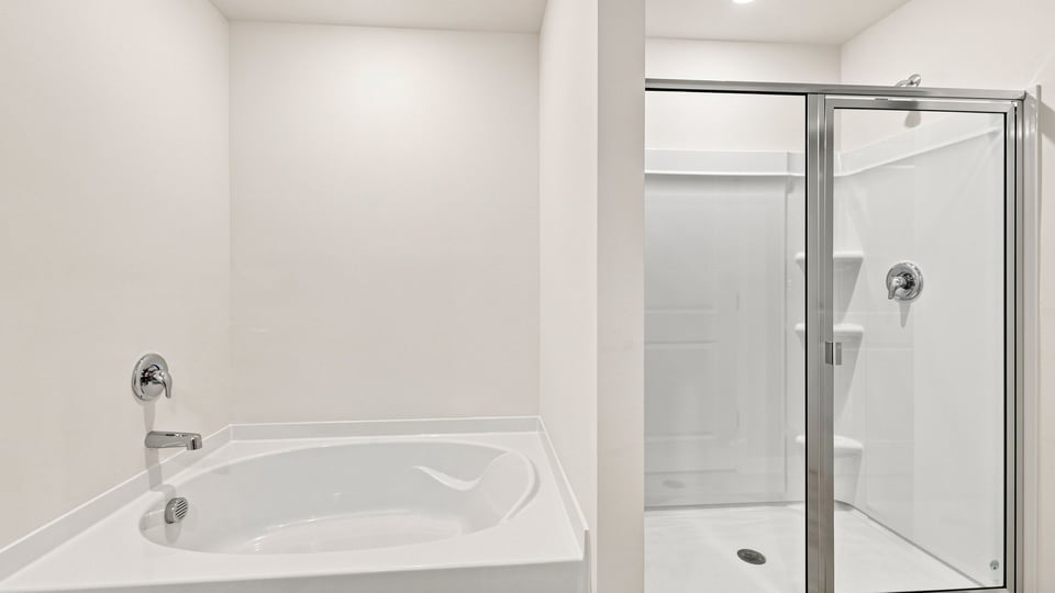 Primary bathroom with double vanity sinks.