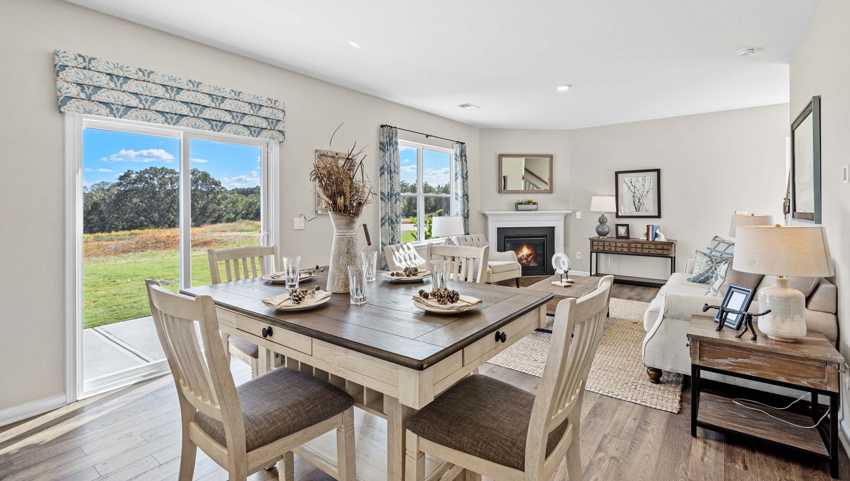 Living area with windows and fireplace.