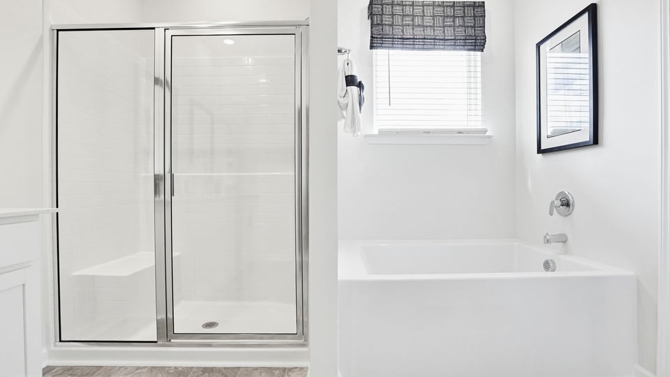 Primary bathroom with double vanity sink.