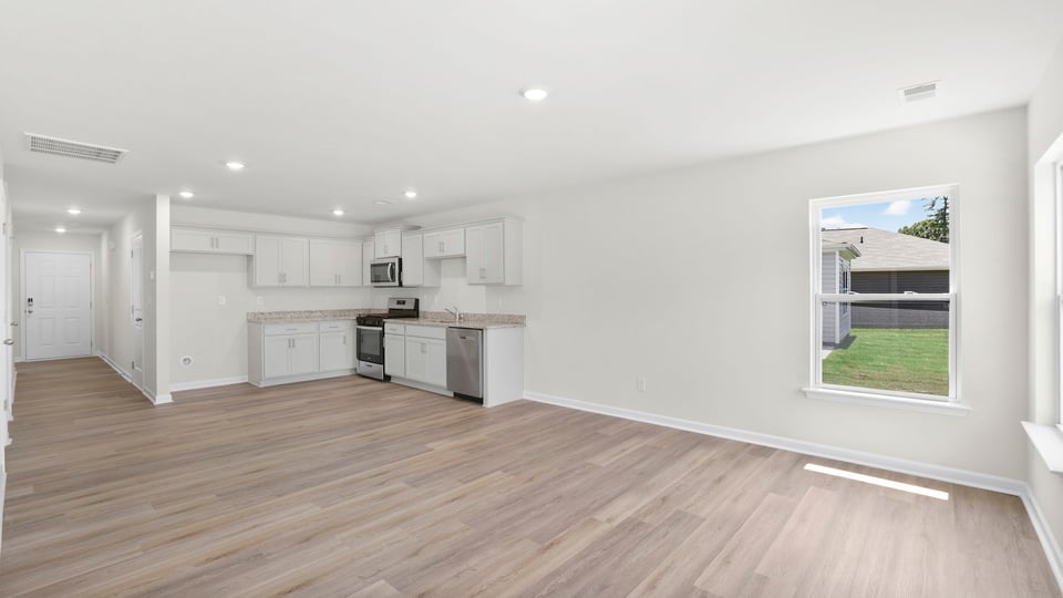 Kitchen with island and countertops.