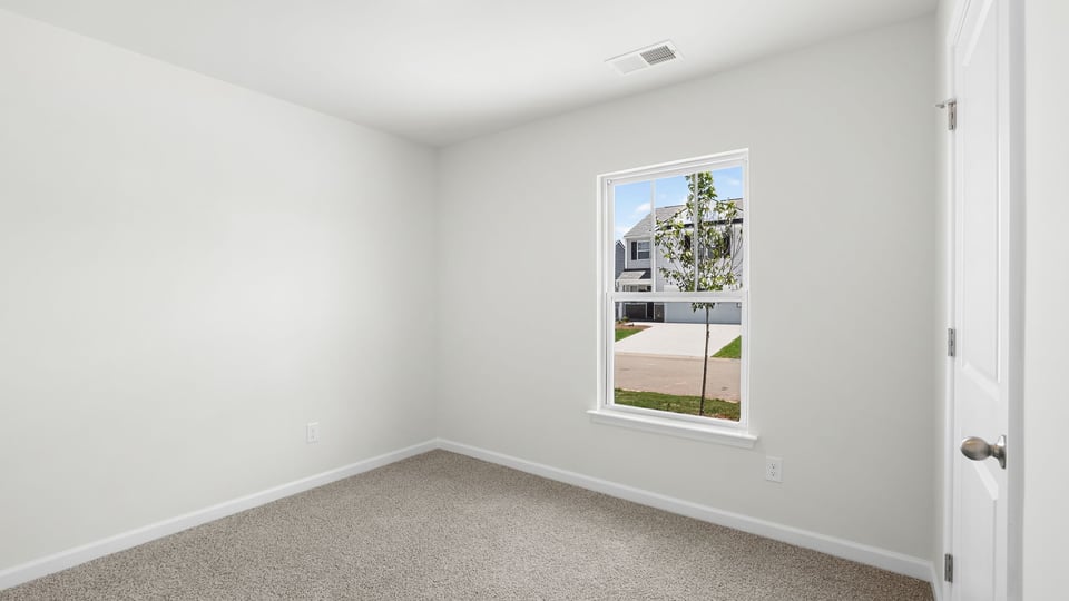 Bedroom with windows.
