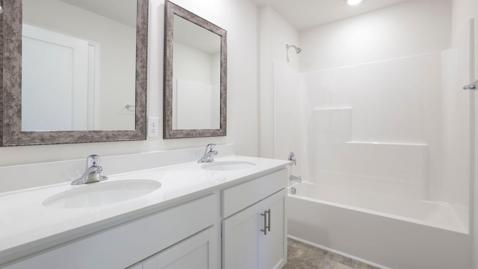 Bedroom with vanity.