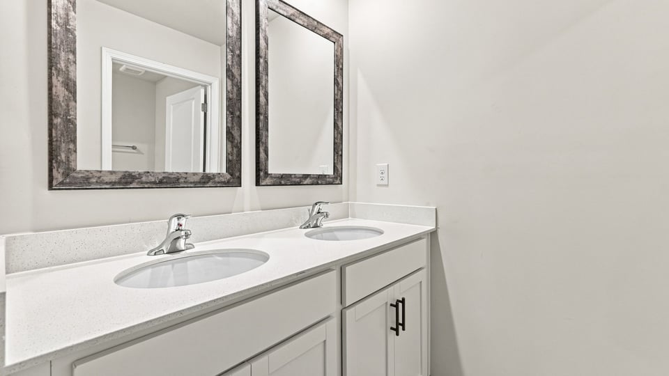 Bathroom with double vanity sink.