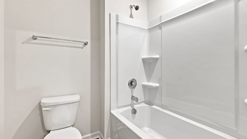 Bathroom with bathtub.