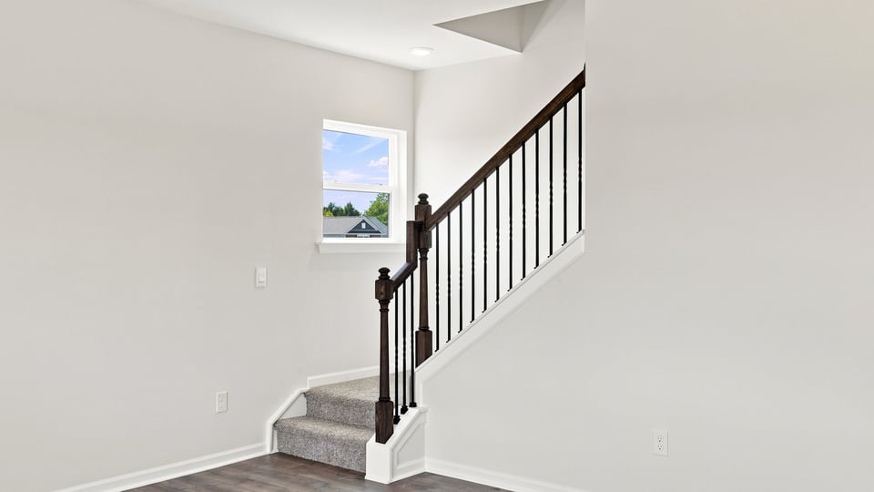 View of stairs to bedroom.