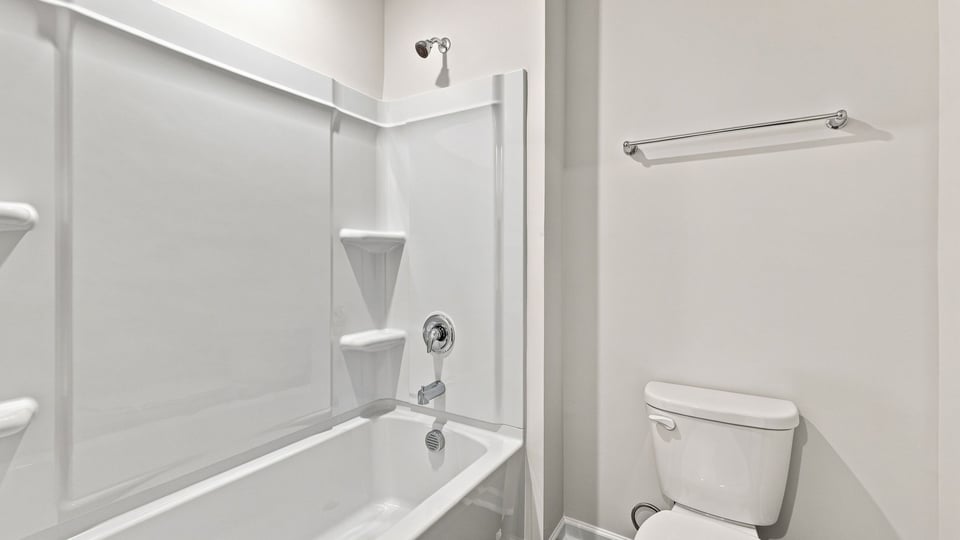 Bathroom with bathtub.