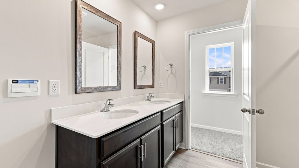 Bathroom with double vanity sink.