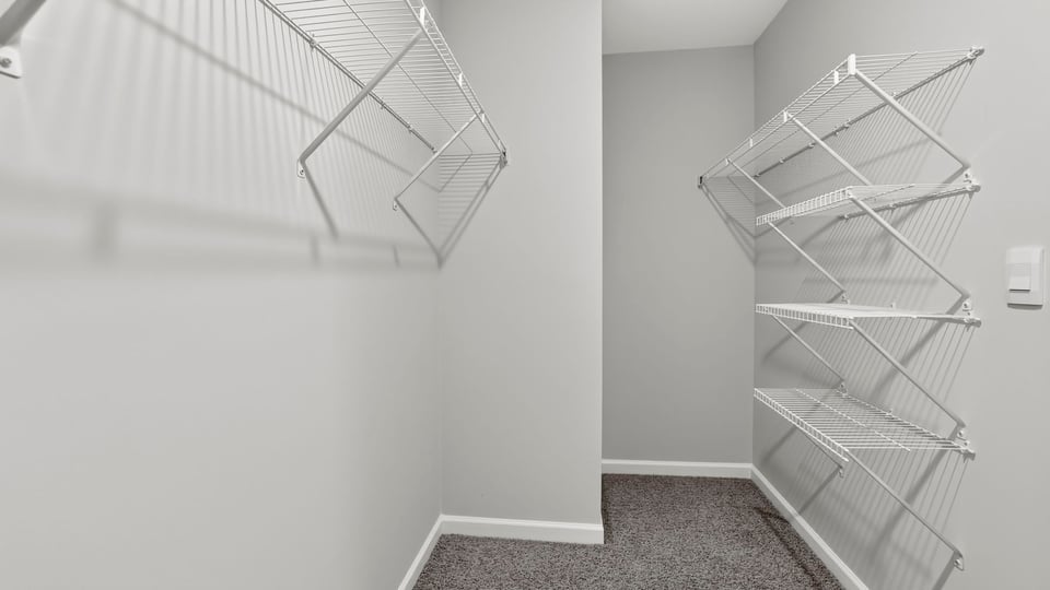 Primary closet with window.