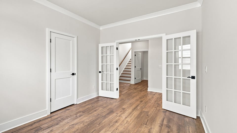 Bedroom with closet and window.