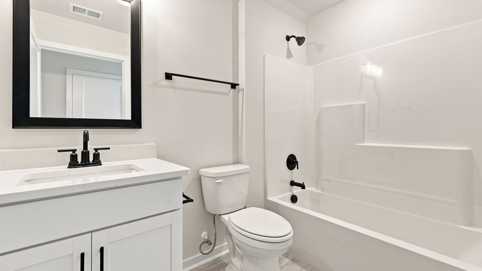 Bathroom with vanity sink.