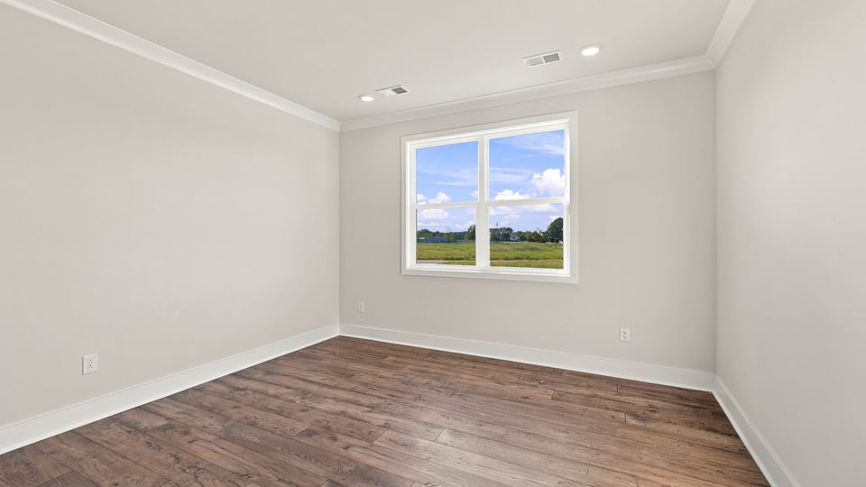 Bedroom with windows.