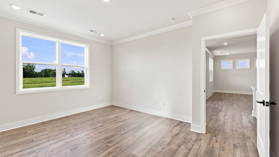 Bedroom with windows.
