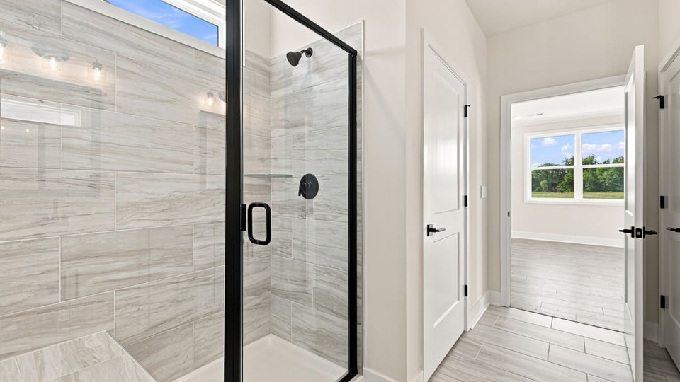 Primary bathroom with vanity sinks.