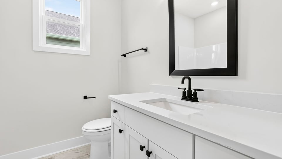 Bathroom with double vanity sink.