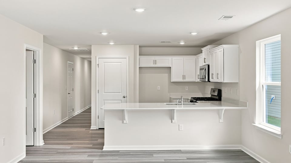 Kitchen with stainless steel appliances.