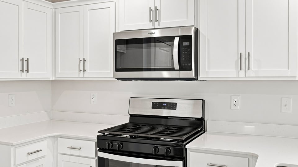 Kitchen with stainless steel appliances.