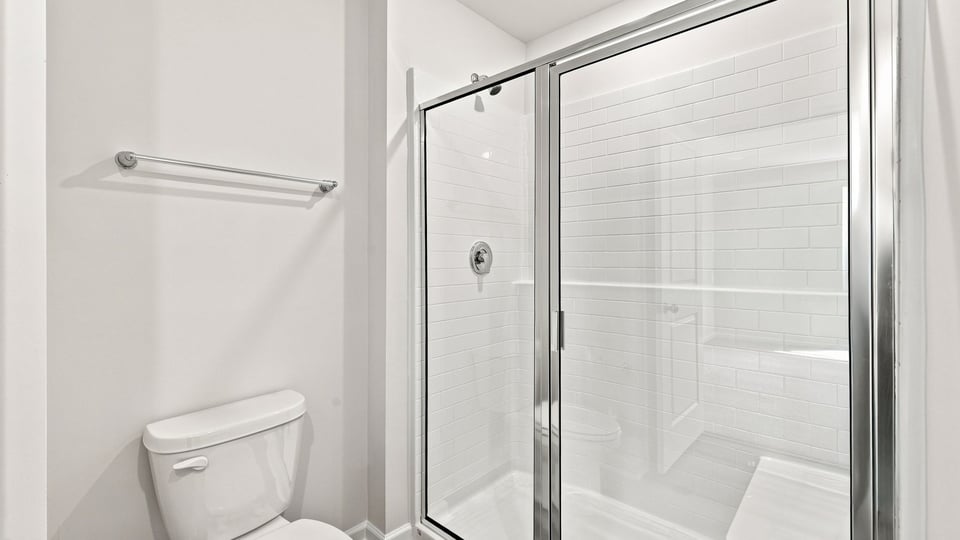 Bathroom with walk in shower.
