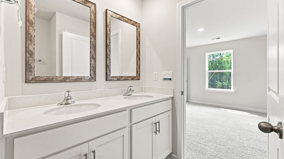 Bathroom with double vanity sink.