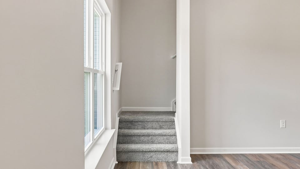 View of stairs to bedroom.