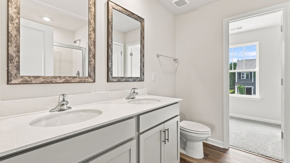 Bathroom with double vanity sink.