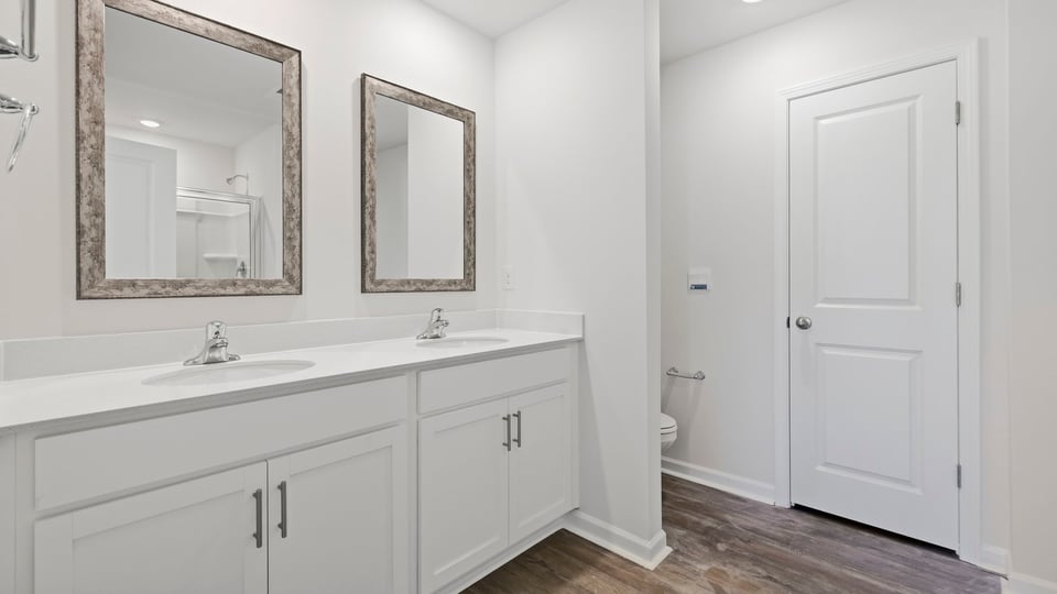 Bathroom with double vanity sink.