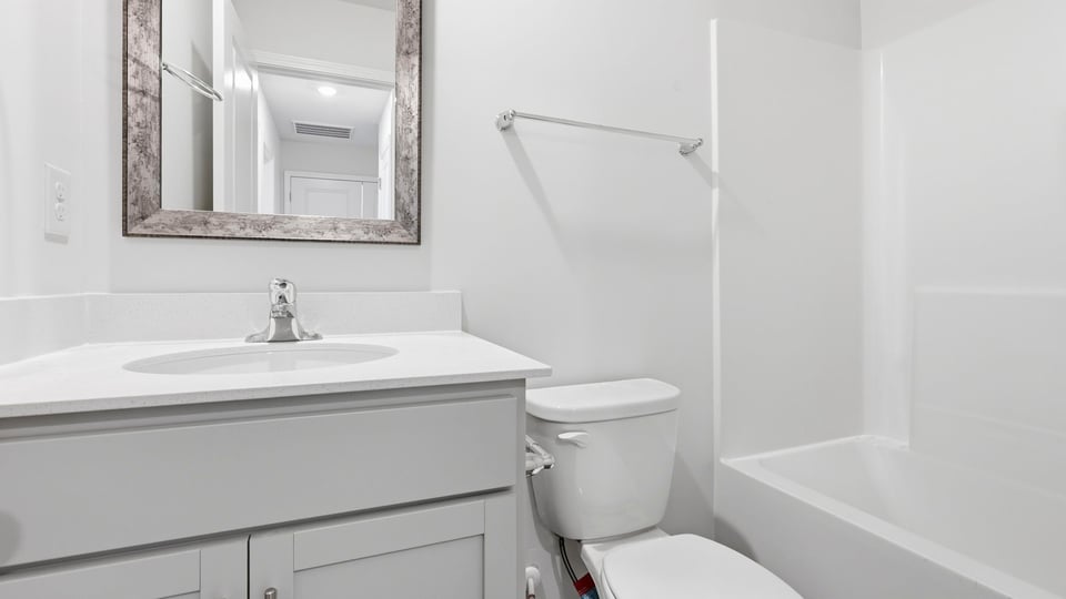 Bathroom with sink and bathub.