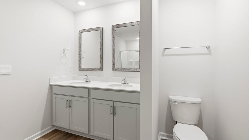 Bathroom with double vanity sink.