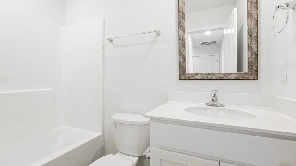 Bathroom with single vanity sink.