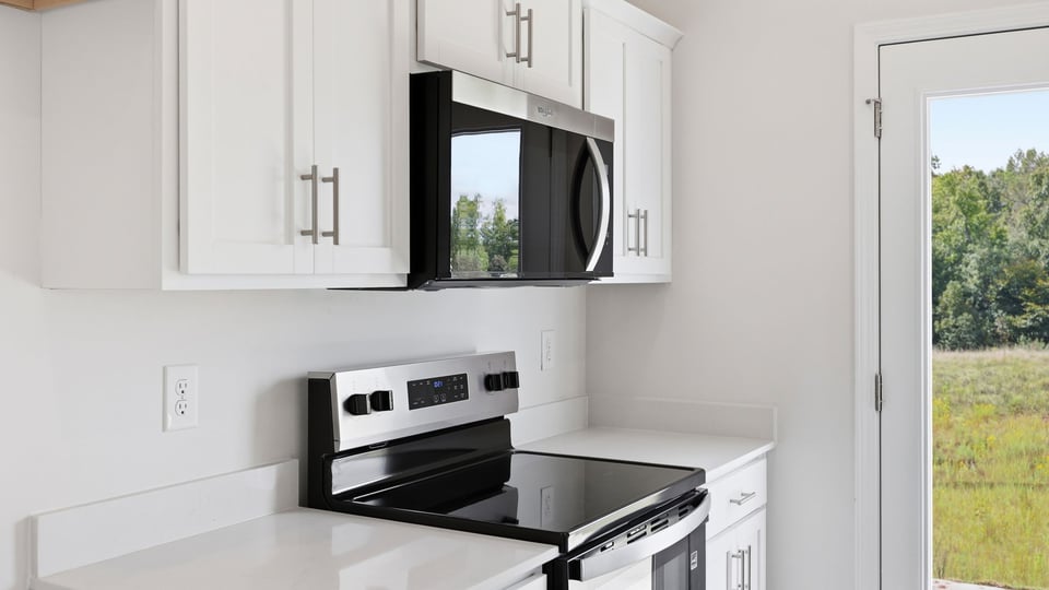 Kitchen with stainless steel appliances.