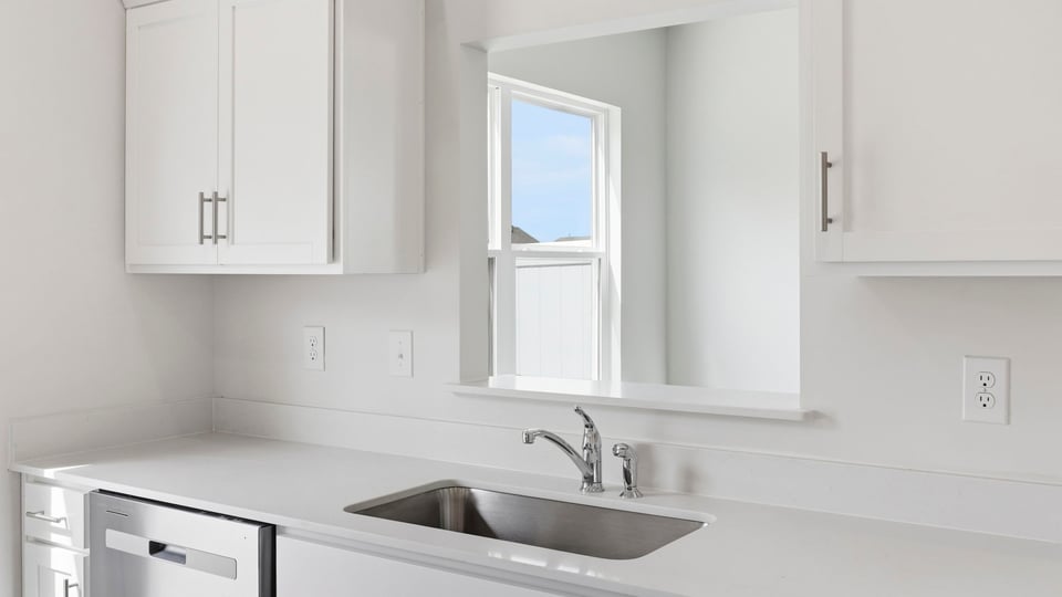 Kitchen with stainless steel appliances.