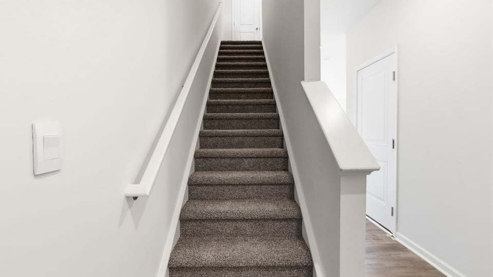 Stairs to bedrooms.