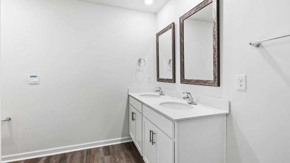 Bathroom with double vanity sink.