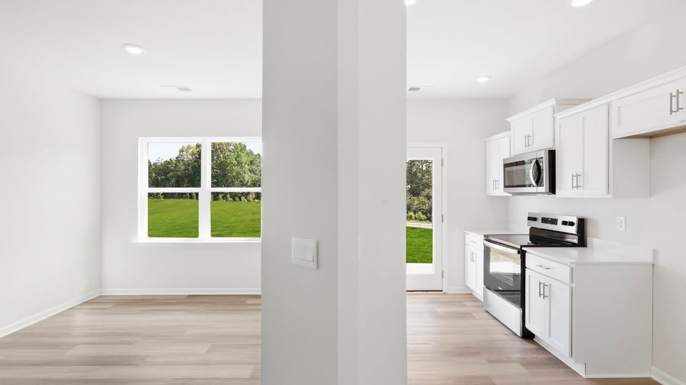 Kitchen with stainless steel appliances.
