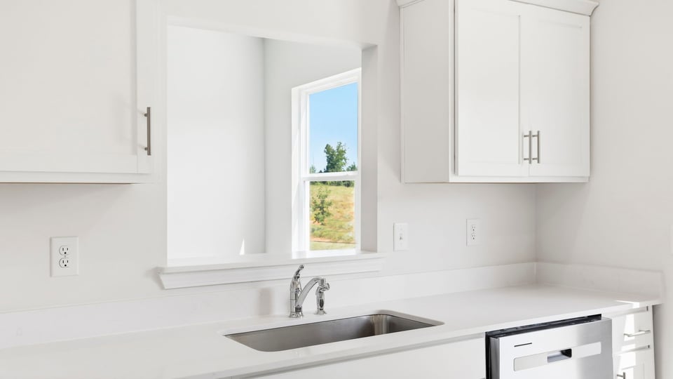Kitchen with stainless steel appliances.
