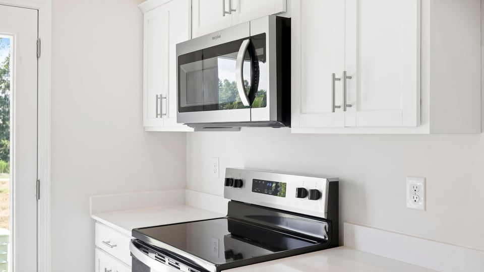 Kitchen with stainless steel appliances.