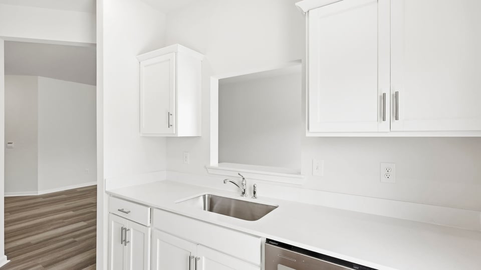 Kitchen with stainless steel appliances.