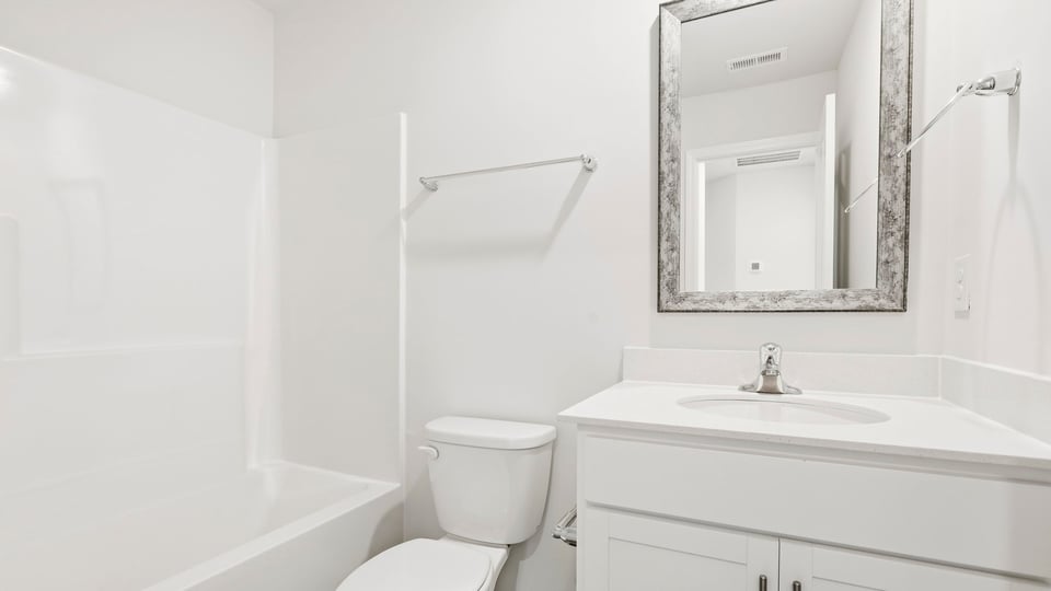 Bathroom with bathtub.