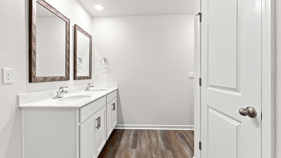 Bathroom with double vanity sink.