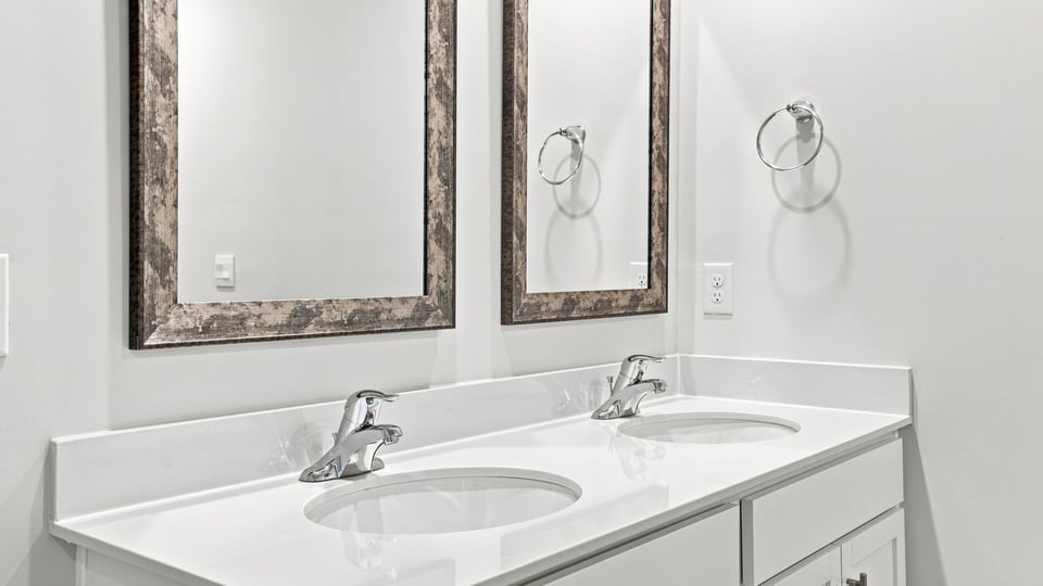 Primary bathroom with double vanity sink