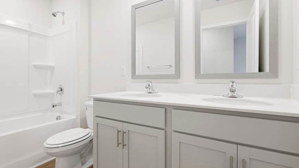 Bathroom with double vanity sink.