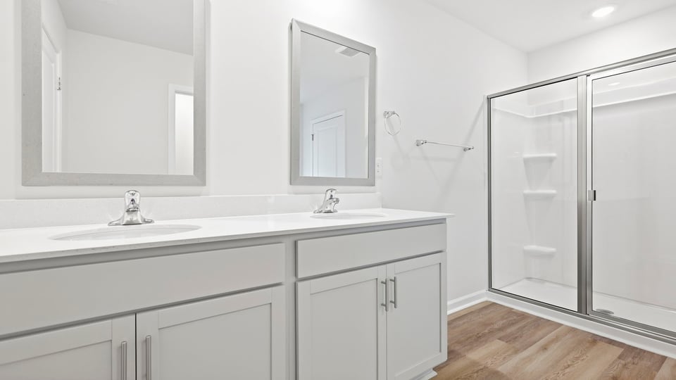 Bathroom with walk in shower.
