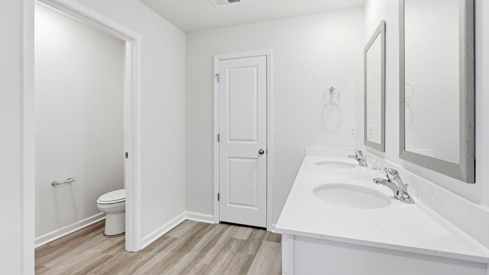 Bathroom with double vanity sink.