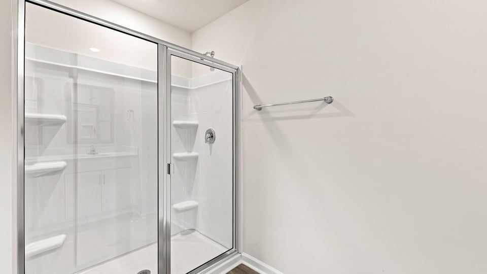 Bathroom with walk in shower.